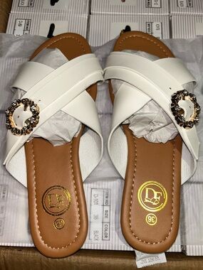 DE Fashion White Crisscross Slide Sandals with Decorative Gem Buckle